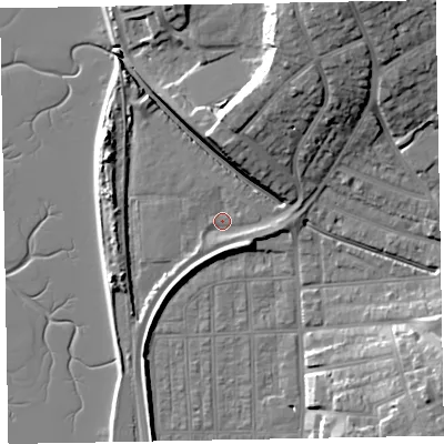 Shaded relief map of the ground around EX83EE, computed from Environment Agency LiDAR. The ground here sits at about 3 m above sea level and falls 22 m across the surrounding 800 m. Surface water reaching this point runs off ground lying to the north-north-east, 20.6 m higher.