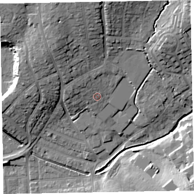 Shaded relief map of the ground around EX83HU, computed from Environment Agency LiDAR. The ground here sits at about 12 m above sea level and falls 28 m across the surrounding 800 m. Surface water reaching this point runs off ground lying to the north-west, 4.8 m higher.