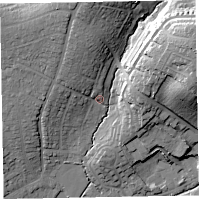 Shaded relief map of the ground around EX83JT, computed from Environment Agency LiDAR. The ground here sits at about 24 m above sea level and falls 49 m across the surrounding 800 m. Surface water reaching this point runs off ground lying to the north-west, 14.7 m higher.