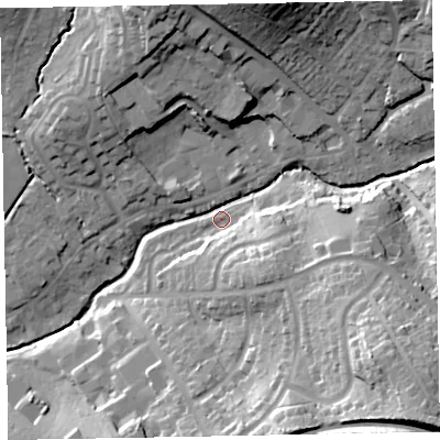 Shaded relief map of the ground around EX83RA, computed from Environment Agency LiDAR. The ground here sits at about 13 m above sea level and falls 44 m across the surrounding 800 m. Surface water reaching this point runs off ground lying to the north-north-east, 33.9 m higher.