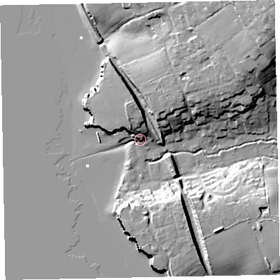 Shaded relief map of the ground around EX85EU, computed from Environment Agency LiDAR. The ground here sits at about 7 m above sea level and falls 33 m across the surrounding 800 m. Surface water reaching this point runs off ground lying to the north-north-west, 11.1 m higher.