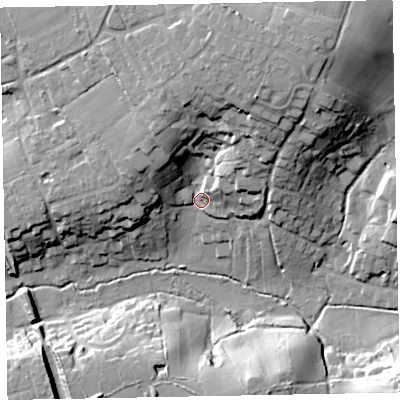 Shaded relief map of the ground around EX85JU, computed from Environment Agency LiDAR. The ground here sits at about 12 m above sea level and falls 37 m across the surrounding 800 m. Surface water reaching this point runs off ground lying to the north-north-east, 27.8 m higher.