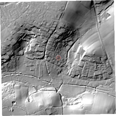 Shaded relief map of the ground around EX85LB, computed from Environment Agency LiDAR. The ground here sits at about 15 m above sea level and falls 35 m across the surrounding 800 m. Surface water reaching this point runs off ground lying to the north-north-west, 11.0 m higher.