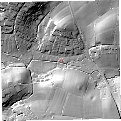 Shaded relief map of the ground around EX85LJ, computed from Environment Agency LiDAR. The ground here sits at about 11 m above sea level and falls 42 m across the surrounding 800 m. Surface water reaching this point runs off ground lying to the north-east, 37.0 m higher.