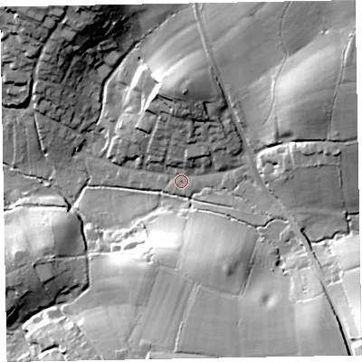 Shaded relief map of the ground around EX85LL, computed from Environment Agency LiDAR. The ground here sits at about 11 m above sea level and falls 45 m across the surrounding 800 m. Surface water reaching this point runs off ground lying to the north, 18.4 m higher.