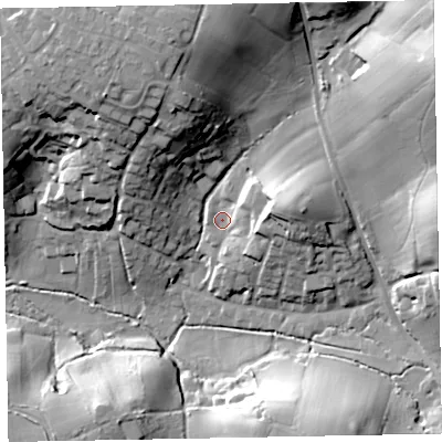 Shaded relief map of the ground around EX85TT, computed from Environment Agency LiDAR. The ground here sits at about 13 m above sea level and falls 39 m across the surrounding 800 m. Surface water reaching this point runs off ground lying to the east, 15.8 m higher.