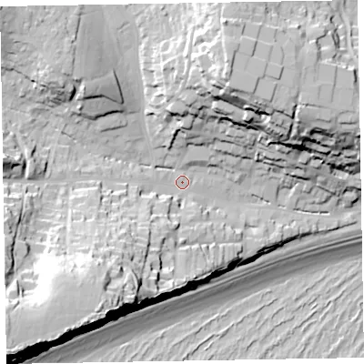 Shaded relief map of the ground around EX96LJ, computed from Environment Agency LiDAR. The ground here sits at about 13 m above sea level and falls 62 m across the surrounding 800 m. Surface water reaching this point runs off ground lying to the south-west, 46.9 m higher.