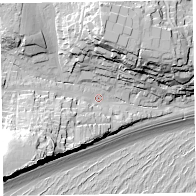 Shaded relief map of the ground around EX96LQ, computed from Environment Agency LiDAR. The ground here sits at about 11 m above sea level and falls 60 m across the surrounding 800 m. Surface water reaching this point runs off ground lying to the south-west, 46.4 m higher.