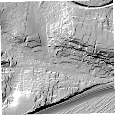 Shaded relief map of the ground around EX96LT, computed from Environment Agency LiDAR. The ground here sits at about 15 m above sea level and falls 61 m across the surrounding 800 m. Surface water reaching this point runs off ground lying to the north, 7.0 m higher.