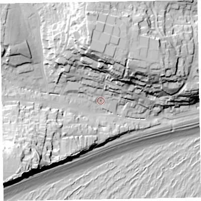 Shaded relief map of the ground around EX96LX, computed from Environment Agency LiDAR. The ground here sits at about 11 m above sea level and falls 59 m across the surrounding 800 m. Surface water reaching this point runs off ground lying to the south-west, 44.2 m higher.