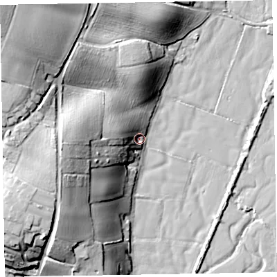 Shaded relief map of the ground around EX97BB, computed from Environment Agency LiDAR. The ground here sits at about 6 m above sea level and falls 38 m across the surrounding 800 m. Surface water reaching this point runs off ground lying to the west-north-west, 15.9 m higher.
