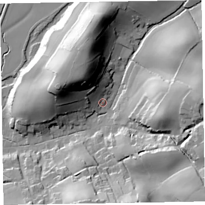 Shaded relief map of the ground around EX97EY, computed from Environment Agency LiDAR. The ground here sits at about 18 m above sea level and falls 53 m across the surrounding 800 m. Surface water reaching this point runs off ground lying to the north-west, 36.2 m higher.