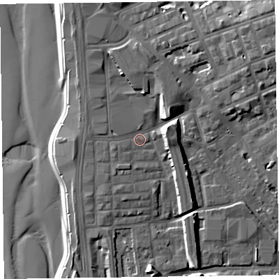 Shaded relief map of the ground around FY15AW, computed from Environment Agency LiDAR. The ground here sits at about 7 m above sea level and falls 17 m across the surrounding 800 m. Surface water reaching this point runs off ground lying to the south-west, 2.1 m higher.