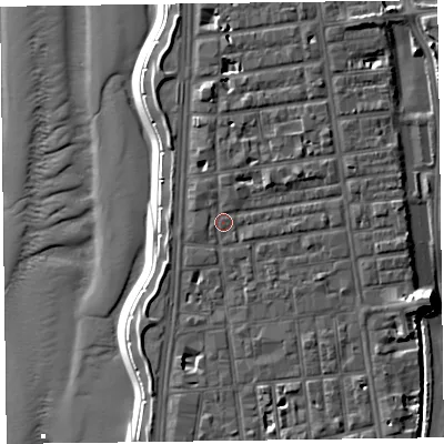 Shaded relief map of the ground around FY16AB, computed from Environment Agency LiDAR. The ground here sits at about 7 m above sea level and falls 13 m across the surrounding 800 m. Surface water reaching this point runs off ground lying to the east-north-east, 2.5 m higher.