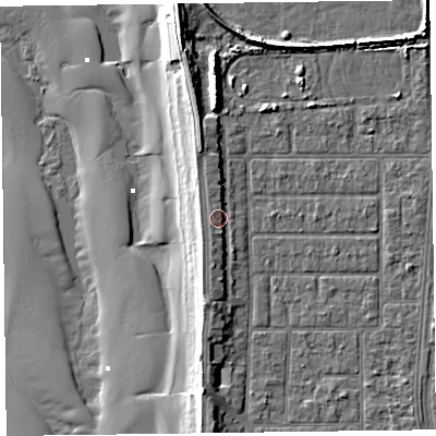 Shaded relief map of the ground around FY51LP, computed from Environment Agency LiDAR. The ground here sits at about 7 m above sea level and falls 13 m across the surrounding 800 m. Surface water reaching this point runs off ground lying to the south, 2.2 m higher.