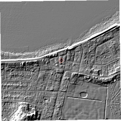 Shaded relief map of the ground around FY60AG, computed from Environment Agency LiDAR. The ground here sits at about 7 m above sea level and falls 7 m across the surrounding 800 m. Surface water reaching this point runs off ground lying to the north-north-west, 1.1 m higher.