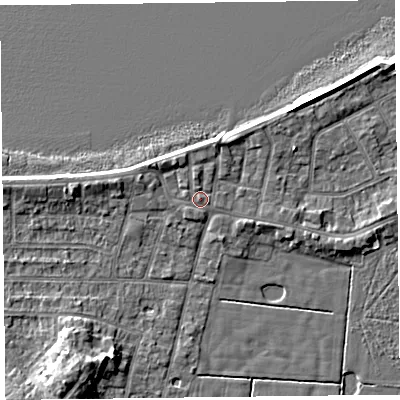 Shaded relief map of the ground around FY60AQ, computed from Environment Agency LiDAR. The ground here sits at about 7 m above sea level and falls 7 m across the surrounding 800 m. Surface water reaching this point runs off ground lying to the north, 1.1 m higher.