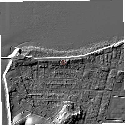 Shaded relief map of the ground around FY60BQ, computed from Environment Agency LiDAR. The ground here sits at about 7 m above sea level and falls 9 m across the surrounding 800 m. Surface water reaching this point runs off ground lying to the east-north-east, 1.6 m higher.