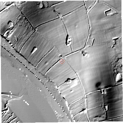 Shaded relief map of the ground around FY69DX, computed from Environment Agency LiDAR. The ground here sits at about 12 m above sea level and falls 22 m across the surrounding 800 m. Surface water reaching this point runs off ground lying to the south-east, 6.6 m higher.