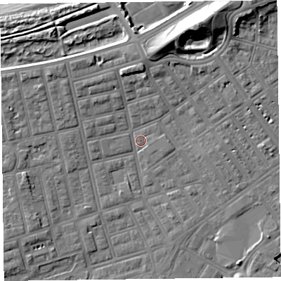 Shaded relief map of the ground around FY76QP, computed from Environment Agency LiDAR. The ground here sits at about 5 m above sea level and falls 17 m across the surrounding 800 m. Surface water reaching this point runs off ground lying to the north-north-east, 14.7 m higher.