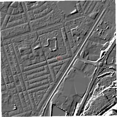 Shaded relief map of the ground around FY77LU, computed from Environment Agency LiDAR. The ground here sits at about 5 m above sea level and falls 13 m across the surrounding 800 m. Surface water reaching this point runs off ground lying to the north-north-east, 1.4 m higher.