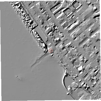 Shaded relief map of the ground around FY82NG, computed from Environment Agency LiDAR. The ground here sits at about 9 m above sea level and falls 11 m across the surrounding 800 m. Surface water reaching this point runs off ground lying to the south-east, 2.7 m higher.