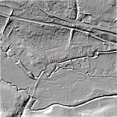 Shaded relief map of the ground around GL102AX, computed from Environment Agency LiDAR. The ground here sits at about 24 m above sea level and falls 19 m across the surrounding 800 m. Surface water reaching this point runs off ground lying to the east-north-east, 1.3 m higher.