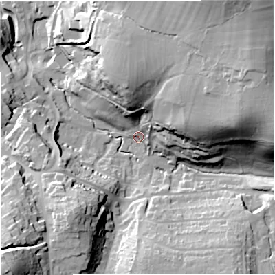 Shaded relief map of the ground around GL115AA, computed from Environment Agency LiDAR. The ground here sits at about 64 m above sea level and falls 53 m across the surrounding 800 m. Surface water reaching this point runs off ground lying to the east-north-east, 38.9 m higher.