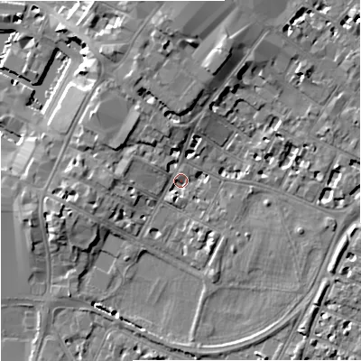Shaded relief map of the ground around GL11JS, computed from Environment Agency LiDAR. The ground here sits at about 14 m above sea level and falls 11 m across the surrounding 800 m. Surface water reaching this point runs off ground lying to the north, 8.0 m higher.