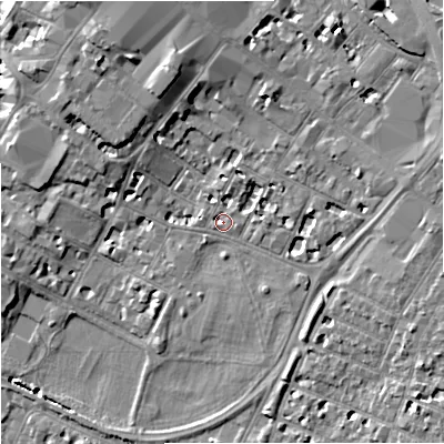 Shaded relief map of the ground around GL11LN, computed from Environment Agency LiDAR. The ground here sits at about 15 m above sea level and falls 10 m across the surrounding 800 m. Surface water reaching this point runs off ground lying to the north-north-west, 6.6 m higher.