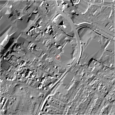 Shaded relief map of the ground around GL11QB, computed from Environment Agency LiDAR. The ground here sits at about 16 m above sea level and falls 8 m across the surrounding 800 m. Surface water reaching this point runs off ground lying to the south-east, 1.6 m higher.