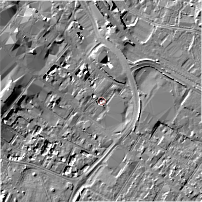 Shaded relief map of the ground around GL11QD, computed from Environment Agency LiDAR. The ground here sits at about 15 m above sea level and falls 7 m across the surrounding 800 m. Surface water reaching this point runs off ground lying to the east, 4.7 m higher.