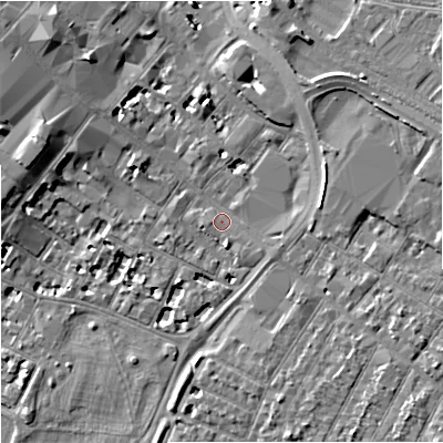 Shaded relief map of the ground around GL11QT, computed from Environment Agency LiDAR. The ground here sits at about 16 m above sea level and falls 8 m across the surrounding 800 m. Surface water reaching this point runs off ground lying to the east-south-east, 1.6 m higher.