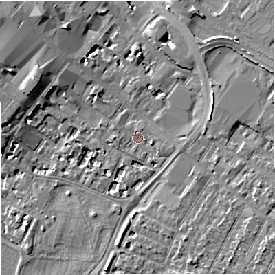 Shaded relief map of the ground around GL11QX, computed from Environment Agency LiDAR. The ground here sits at about 16 m above sea level and falls 8 m across the surrounding 800 m. Surface water reaching this point runs off ground lying to the north, 1.1 m higher.