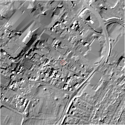 Shaded relief map of the ground around GL11RA, computed from Environment Agency LiDAR. The ground here sits at about 16 m above sea level and falls 10 m across the surrounding 800 m. Surface water reaching this point runs off ground lying to the east-south-east, 1.2 m higher.