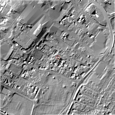 Shaded relief map of the ground around GL11RE, computed from Environment Agency LiDAR. The ground here sits at about 16 m above sea level and falls 11 m across the surrounding 800 m. Surface water reaching this point runs off ground lying to the east-north-east, 0.8 m higher.