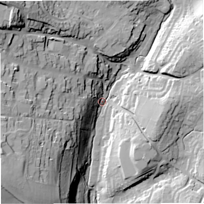 Shaded relief map of the ground around GL127JW, computed from Environment Agency LiDAR. The ground here sits at about 64 m above sea level and falls 57 m across the surrounding 800 m. Surface water reaching this point runs off ground lying to the north-west, 50.7 m higher.