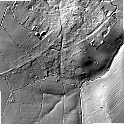 Shaded relief map of the ground around GL128RU, computed from Environment Agency LiDAR. The ground here sits at about 52 m above sea level and falls 18 m across the surrounding 800 m. Surface water reaching this point runs off ground lying to the west-north-west, 8.6 m higher.