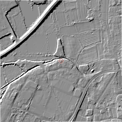 Shaded relief map of the ground around GL12BT, computed from Environment Agency LiDAR. The ground here sits at about 12 m above sea level and falls 7 m across the surrounding 800 m. Surface water reaching this point runs off ground lying to the east-south-east, 4.3 m higher.