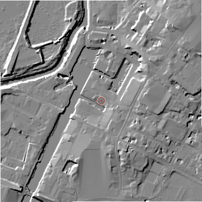 Shaded relief map of the ground around GL12DN, computed from Environment Agency LiDAR. The ground here sits at about 11 m above sea level and falls 15 m across the surrounding 800 m. Surface water reaching this point runs off ground lying to the north-east, 11.3 m higher.