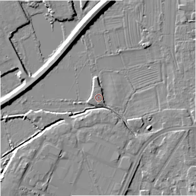 Shaded relief map of the ground around GL12DW, computed from Environment Agency LiDAR. The ground here sits at about 11 m above sea level and falls 8 m across the surrounding 800 m. Surface water reaching this point runs off ground lying to the south, 0.7 m higher.