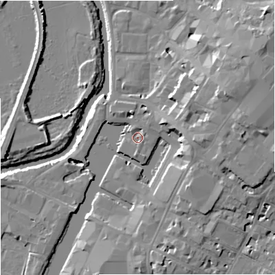 Shaded relief map of the ground around GL12ES, computed from Environment Agency LiDAR. The ground here sits at about 11 m above sea level and falls 15 m across the surrounding 800 m. Surface water reaching this point runs off ground lying to the south, 1.6 m higher.