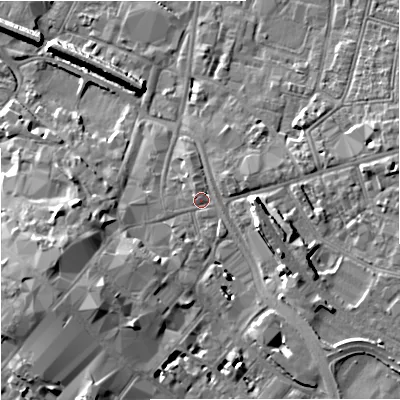 Shaded relief map of the ground around GL12FE, computed from Environment Agency LiDAR. The ground here sits at about 15 m above sea level and falls 11 m across the surrounding 800 m. Surface water reaching this point runs off ground lying to the south-west, 6.7 m higher.