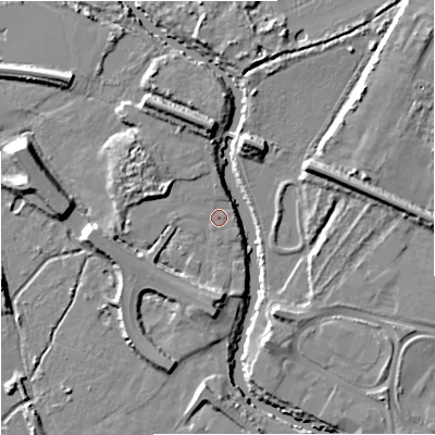Shaded relief map of the ground around GL12GB, computed from Environment Agency LiDAR. The ground here sits at about 10 m above sea level and falls 9 m across the surrounding 800 m. Surface water reaching this point runs off ground lying to the west-north-west, 4.9 m higher.