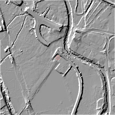 Shaded relief map of the ground around GL12JQ, computed from Environment Agency LiDAR. The ground here sits at about 10 m above sea level and falls 10 m across the surrounding 800 m. Surface water reaching this point runs off ground lying to the north, 3.3 m higher.
