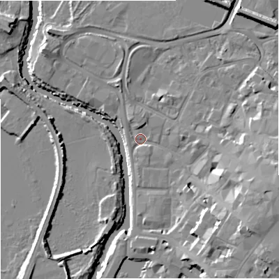 Shaded relief map of the ground around GL12JS, computed from Environment Agency LiDAR. The ground here sits at about 10 m above sea level and falls 15 m across the surrounding 800 m. Surface water reaching this point runs off ground lying to the south-east, 11.6 m higher.