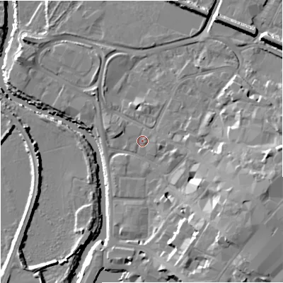 Shaded relief map of the ground around GL12JX, computed from Environment Agency LiDAR. The ground here sits at about 11 m above sea level and falls 15 m across the surrounding 800 m. Surface water reaching this point runs off ground lying to the north-east, 1.3 m higher.