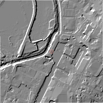 Shaded relief map of the ground around GL12LE, computed from Environment Agency LiDAR. The ground here sits at about 11 m above sea level and falls 15 m across the surrounding 800 m. Surface water reaching this point runs off ground lying to the south, 6.5 m higher.