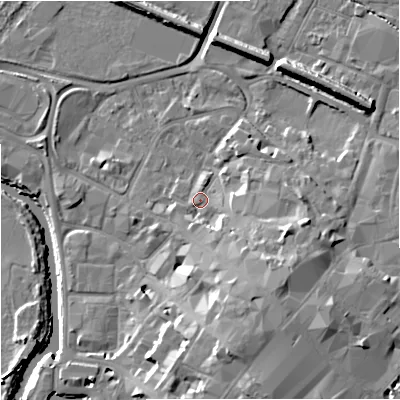 Shaded relief map of the ground around GL12LX, computed from Environment Agency LiDAR. The ground here sits at about 13 m above sea level and falls 15 m across the surrounding 800 m. Surface water reaching this point runs off ground lying to the south-east, 4.7 m higher.