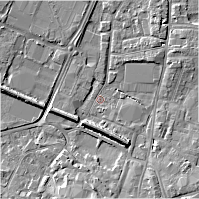 Shaded relief map of the ground around GL12QP, computed from Environment Agency LiDAR. The ground here sits at about 11 m above sea level and falls 9 m across the surrounding 800 m. Surface water reaching this point runs off ground lying to the south-south-east, 8.2 m higher.